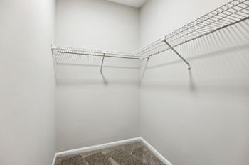 A spacious walk in closet in the second bedroom